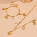 Detailed view of stainless steel ocean charm jewelry set with shells and pearls - Shell Beach Jewelry Set (T701-T708)