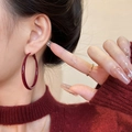 Close-up of a model wearing large dark red acrylic hoop earrings in a minimalist style - 103# 5cm Diameter Hoop / 5cm / Dark Red