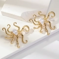 Golden octopus earrings with pearl inlay and black stone accents on white background - Simulated Gold White Artificial Pearl Style (WEH5099)