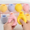 Squeeze duckling sensory fidget toy in colorful baskets for stress relief fun - Chicken Nest Squeeze Toy