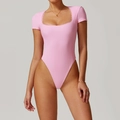 Pink short sleeve ribbed yoga bodysuit featuring square neck and delicate lace trim - S / Sakura Pink