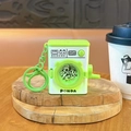 Stress-relief green cartoon washing machine keychain with panda and manual crank - Green