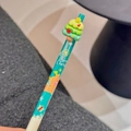 Detail of Christmas retractable gel pen featuring 3D resin tree topper and festive prints - Christmas Tree-Blue