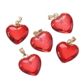 Macro detail of five red translucent acrylic heart pendants with gold metal clasps - Small Glass Red (10pcs/pack)