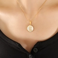 18K gold plated Gemini zodiac necklace with white shell pendant on a fine O-chain - Gold Gemini