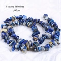 Detailed view of one 16-inch strand of irregular blue natural stone beads for DIY jewelry - Lapis Lazuli