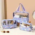 Three-piece purple transparent PVC makeup bags with sea creature patterns and handles - Small, Medium And Large Bag Set / Purple Ocean World