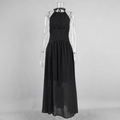 Detail of black polka dot halter dress featuring a backless design and premium fabric - S / Black