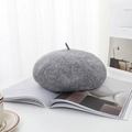 Classic grey wool beret hat for women on aesthetic magazine backdrop for a vintage look - One Size / Gray