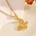 Macro shot of gold butterfly necklace with white zircon pavé and delicate link chain - Gold Double Layer Butterfly Diamond Necklace