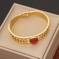 Vintage golden hollow leaf bangle with a red cat eye stone set on a jewelry display box - Gold Plant Leaf Hollow Inlaid Red Gemstone Style (6#)