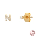 Detail of S925 sterling silver golden letter N earring with inlaid clear gemstone - Letter N / Gold
