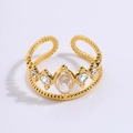 Elegant gold crown-shaped titanium ring with clear gemstones and textured band - Crown White Stone Style (JZ24-1)