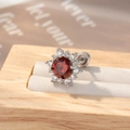 Silver snowflake titanium steel stud with a round red zircon and screw back closure - Garnet Red