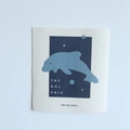 Absorbent wood pulp cotton dishcloth featuring a blue dolphin and Smiling Angel pattern - Dolphin