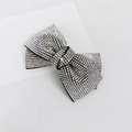 Detail shot of a luxury black bow hair clip featuring shimmering silver rhinestones - 8cm Medium Cross Double Cord White Rhinestone