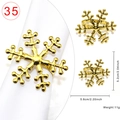 Detalle macro del servilletero de copo de nieve dorado con dimensiones y acabado - 35-Copo de Nieve Dorado