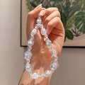 Handmade beaded keychain with light blue resin flower and transparent faceted beads - Blue and White Floral