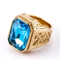 Macro view of gold stainless steel ring featuring a large rectangular blue gemstone - US 7 / Gold Aqua Blue Gemstone