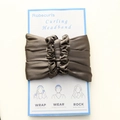 Heatless hair curler in dark brown satin finish on brand packaging card - Grey Green