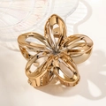 Detailed close-up of golden hollow frangipani flower metal hair claw clip for women - 7.5cm Hollow Frangipani / Gold