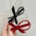 Velvet bow hair ties in black and red with sparkling rhinestone ring accents - Black & Red Criss-cross Hair Tie Set