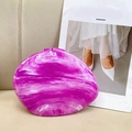 Detailed close-up of purple marble texture resin clutch bag on soft leather background - Violet