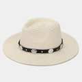 Close-up of cream woven straw fedora hat with silver-studded black leather band decor - Beige