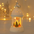Close-up of a white LED Christmas lantern featuring a glowing tree and gift box scene - Christmas Tree