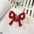 Detalle de la pinza para el pelo con lazo rojo con lunares negros y resorte - Aprox 6cm / Rojo Año Nuevo - Lazo Envuelto