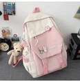 Detail of pink and beige nylon backpack featuring fashion patches and cute cartoon badges - Single Bag / Pink & Beige