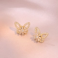 Exquisite 18K gold butterfly earrings with micro-pave cubic zirconia on pink silk fabric - Rotating Butterfly Earrings (E0424) / Gold