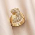 Gold plated wide band ring featuring a letter J shape pavé set with sparkling zircons - Small / Letter J