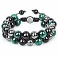 Détails macro des perles oeil de tigre 10mm sur un bracelet tissé à double couche pour homme - Perle 10mm / Oeil de Tigre + Pierre Magnétique + Obsidienne