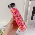 Gomas de pelo elásticas de colores para niñas en cilindro transparente rosa y amarillo - Nylon Fluorescente (Tarro de 400 Piezas)