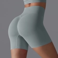 Seamless high waisted yoga shorts in grey blue with scrunch butt lifting design for fitness - Rhino Gray