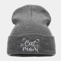 Detailed view of Cat Mom embroidery on a dark grey knitted beanie for women - One Size / Dark Gray