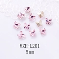Macro detail of 5mm mocha crystal butterfly charms for nail art with faceted finish - Pink Butterfly Style (L201) / 5mm