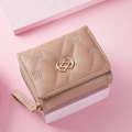 Short khaki faux leather wallet featuring diamond quilting and gold ring buckle - Khaki
