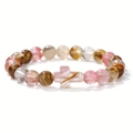 Natural stone turquoise and lava agate beaded bracelet with cross charm on white background - Flower