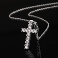 Silver cross pendant necklace with clear zircon stones on a black reflective background - Silver Full Diamond Reflection (款式43)