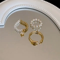 Detailed view of a 3-piece gold and pearl ring set on a reflective silver mirror surface - Smooth and Pearl Beaded Pendant Ring Set / 14# Gold-3pcs Set
