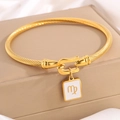 Goldenes Sternbild-Armband Jungfrau mit geflochtener Textur und weißem Emaille-Anhänger - Gold Jungfrau