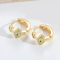 Golden Evil Eye earrings with green and black enamel and clear stones on stone - Cyan