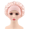 Detail view of the pink satin sleep bonnet with elastic wide band on a mannequin - One Size / Sakura Pink