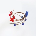 Detail of USA Independence Day napkin ring with red white blue stars and wooden beads - American Independence Day Red White Blue Star Style