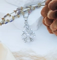 Rotating silver flower necklace featuring marquise zircon crystals on a textured stone base - Rotating Star Windmill (XL2415)