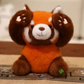 Süße Rote Panda Plüschfigur in sitzender Pose mit orangefarbenem Fell und Kleeblatt - Versteckspiel-Pose / Roter Panda (Orange)
