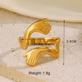 Macro detail of gold hugging hand ring with size dimensions on stone texture - Hugging Style Open Design / Gold Hugging Ring