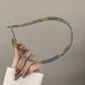 Blue and yellow floral acetate headband featuring anti-slip teeth and slim design - Royal Blue